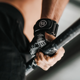 RooGrips Fingerless Black Crossfit Grips With Chalk Demonstrating Barbell Use
